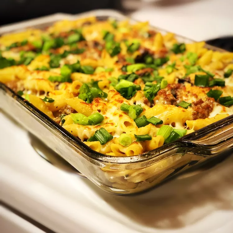This rich, comforting bake features savory Italian sausage, earthy baby portobellos, and a luxurious white wine cream sauce, all topped with golden, bubbly cheese. The ultimate crowd-pleasing pasta casserole!