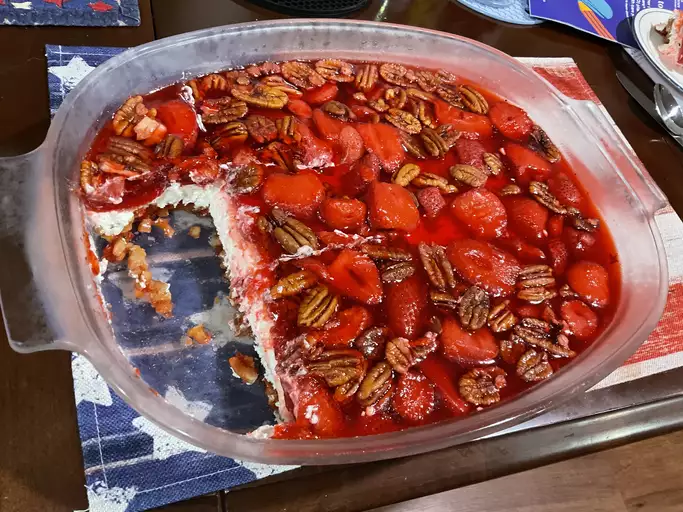 This legendary 3-layer dessert salad combines buttery pretzel crust, creamy cheesecake filling, and fresh strawberry Jell-O topping for the perfect sweet-salty crunch. Always the first to disappear at potlucks!